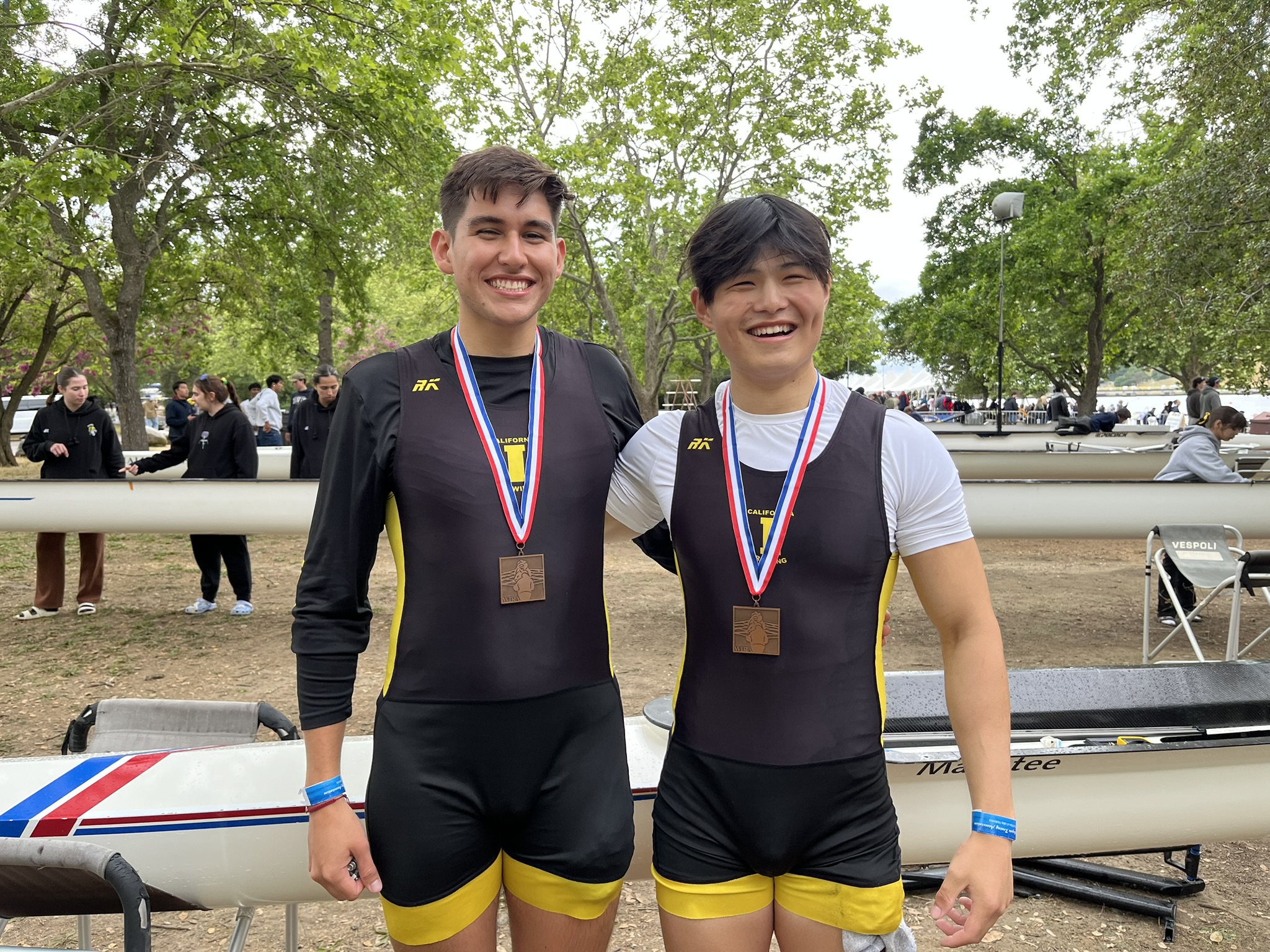 Team celebrating on the dock after finals
